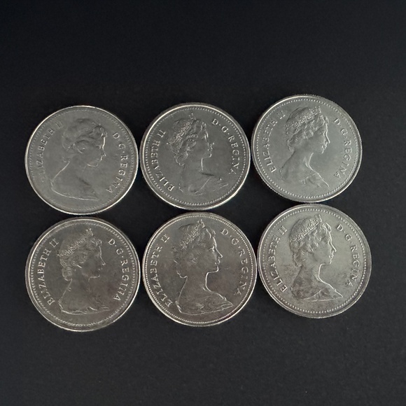 Canada one dollar coins - Picture 1 of 2